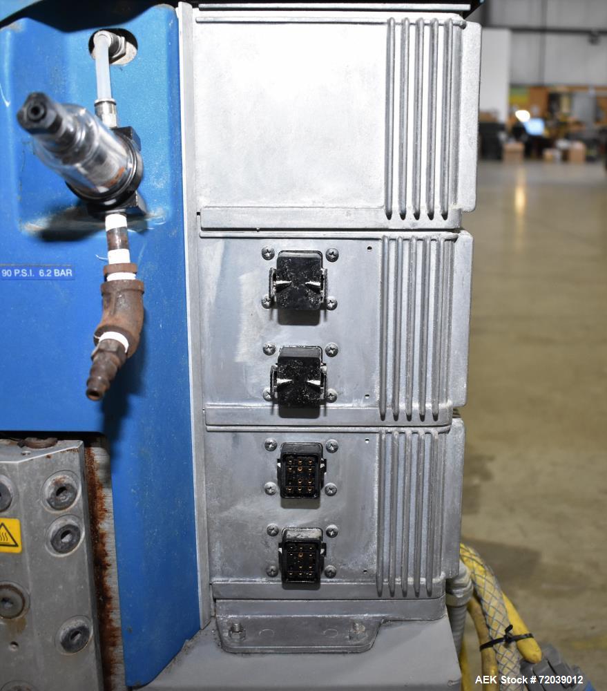 Used Nordson Problue 10 Hot Melt Adhesive Applicator System. Volume 10 liter, melt rate per hour 24 pound, throughput per hour 27.3 pound. Mounted on painted carbon steel frame with casters. Serial# ...